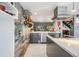 Modern kitchen with stainless steel appliances and an island at 215 Woods Landing Trl, Oldsmar, FL 34677