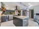 Modern kitchen with stainless steel appliances and an island at 215 Woods Landing Trl, Oldsmar, FL 34677