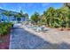 Community patio with seating area and lush landscaping at 3315 58Th S Ave # 210, St Petersburg, FL 33712