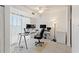 Home office with window, desk, and multiple monitors at 3315 58Th S Ave # 513, St Petersburg, FL 33712