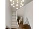 Overhead view of a staircase with decorative vases on the landing at 4518 W Rosemere Rd, Tampa, FL 33609