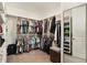 Large walk-in closet with ample shelving and hanging space at 4587 Almada Ln, Wesley Chapel, FL 33543