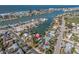 Wide aerial view showing property location, neighborhood, and surrounding water at 505 80Th Ave, St Pete Beach, FL 33706