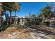 Charming home with a welcoming facade, well-manicured landscaping, and inviting curb appeal at 505 80Th Ave, St Pete Beach, FL 33706