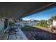 Brick patio with table and chairs, overlooking the water at 505 80Th Ave, St Pete Beach, FL 33706