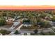 Aerial view of home at sunset, showcasing neighborhood context at 513 Montrose Ave, Temple Terrace, FL 33617