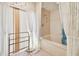 Bathroom with bathtub, shower, and lace curtains at 6101 34Th W St # 29C, Bradenton, FL 34210
