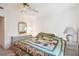 Primary bedroom with a large bed, ceiling fan, and two nightstands at 6101 34Th W St # 29C, Bradenton, FL 34210