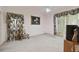 Bright bedroom with sliding doors to balcony and a dresser at 6101 34Th W St # 29C, Bradenton, FL 34210
