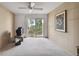 Bright bedroom with sliding glass doors leading to a balcony at 6101 34Th W St # 29C, Bradenton, FL 34210