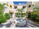 Charming courtyard with a central fountain and lush landscaping at 6101 34Th W St # 29C, Bradenton, FL 34210