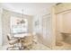 Quaint kitchen with wood cabinets, tile floors, and a breakfast nook at 6101 34Th W St # 29C, Bradenton, FL 34210