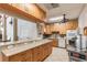 Well-equipped kitchen featuring ample cabinetry and granite countertops at 6101 34Th W St # 29C, Bradenton, FL 34210