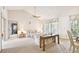 Spacious living room features vaulted ceilings, neutral carpeting, and a comfy seating area at 6101 34Th W St # 29C, Bradenton, FL 34210