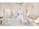 Open living room with vaulted ceilings, neutral carpet, and ample natural light at 6101 34Th W St # 29C, Bradenton, FL 34210
