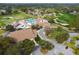 Aerial of clubhouse, pool, and golf course at 6474 Pine Meadows Dr, Spring Hill, FL 34606