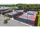 Multiple pickleball courts with shade structures at 6474 Pine Meadows Dr, Spring Hill, FL 34606