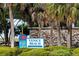 Venice Beach entrance sign with palm trees and stone wall at 664 Allora Ave, Nokomis, FL 34275