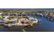 Aerial view of waterfront home with private pool and dock at 925 Golf Island Dr, Apollo Beach, FL 33572