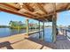 Spacious covered boat dock perfect for enjoying the water at 925 Golf Island Dr, Apollo Beach, FL 33572