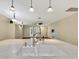 Modern kitchen with a large island and sink overlooking the living room at 9739 Asbel Estates St, Land O Lakes, FL 34638