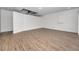Finished basement offering extra living space with wood-look floors at 9800 Mendel Dr, New Port Richey, FL 34654