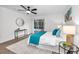 Bedroom with pool view, large closet, ceiling fan, and plenty of natural light at 9800 Mendel Dr, New Port Richey, FL 34654