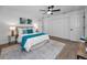 Main bedroom with ceiling fan, ample closet space and sliding glass doors at 9800 Mendel Dr, New Port Richey, FL 34654