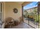 Private balcony with wicker furniture and city views at 100 4Th S Ave # 227, St Petersburg, FL 33701