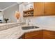 Modern kitchen with granite countertops and a stylish sink at 100 4Th S Ave # 227, St Petersburg, FL 33701