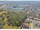 Property view showing house and surrounding community at 10703 Aldo Moro Dr, Wimauma, FL 33598