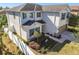 Two-story house with fenced backyard and screened patio at 10703 Aldo Moro Dr, Wimauma, FL 33598