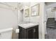 Simple bathroom with a pedestal sink and toilet at 10703 Aldo Moro Dr, Wimauma, FL 33598
