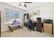 Bright home office features built-in shelving and a large window at 10703 Aldo Moro Dr, Wimauma, FL 33598