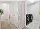 Convenient laundry room with washer and dryer at 10703 Aldo Moro Dr, Wimauma, FL 33598