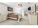 Bright main bedroom with a king-size bed and plenty of natural light at 10703 Aldo Moro Dr, Wimauma, FL 33598