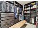Huge walk-in closet with ample shelving and hanging space at 10703 Aldo Moro Dr, Wimauma, FL 33598