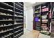 Large walk-in closet with custom shelving for shoes and clothes at 10703 Aldo Moro Dr, Wimauma, FL 33598