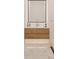 Modern bathroom with floating wooden vanity and marble flooring at 13750 Park Blvd # 8, Seminole, FL 33776