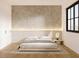 Modern bedroom with platform bed and textured wall at 13750 Park Blvd # 8, Seminole, FL 33776