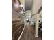 Welcoming entryway with wood plank accent wall and wood-look flooring at 1449 Kaffir Lily Ct, Trinity, FL 34655