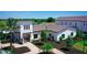 Community clubhouse and surrounding landscape from above at 18364 Cropside Trl, Bradenton, FL 34211