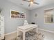 Home office with a desk, chair, and plenty of natural light at 19308 Yellowtail Ct, Venice, FL 34292