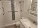 Updated bathroom with walk-in shower, grab bars, and granite countertop at 203 47Th Avenue W Dr # 167, Bradenton, FL 34207