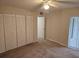 Spacious bedroom with ample closet space and carpeting at 203 47Th Avenue W Dr # 167, Bradenton, FL 34207