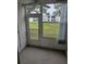 Sun-drenched Florida room with door to backyard at 203 47Th Avenue W Dr # 167, Bradenton, FL 34207