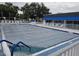Community pool with safety cover at 203 47Th Avenue W Dr # 167, Bradenton, FL 34207