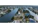 Aerial view of home located on a canal, close to the water at 3270 Hibiscus Dr, Hernando Beach, FL 34607