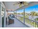 Spacious screened balcony overlooking the water at 3270 Hibiscus Dr, Hernando Beach, FL 34607