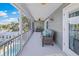Relaxing screened balcony with outdoor seating at 3270 Hibiscus Dr, Hernando Beach, FL 34607